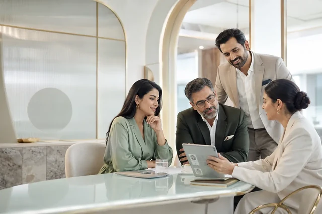 Indian business leaders and an HR consultant discussing a recruitment partnership